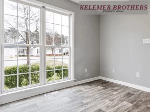 Bright living room with newly installed large windows