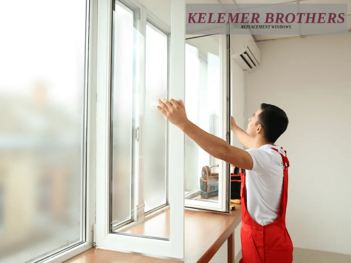 Technician installing a new residential window indoors